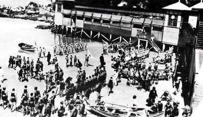 Unusual view of Manly Surf Club with a surf carnival in progress. Pavillion.