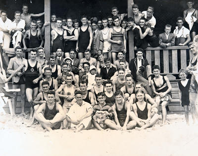 Members of North Steyne Surf Lifesaving Club on the porch of the North Steyne Surf Pavilion