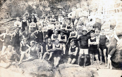 Group portrait of members of Manly Amateur Swimming Club outside Manly Baths