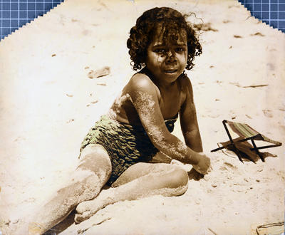 Young aboriginal girl on a beach