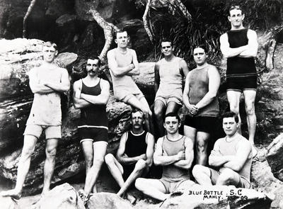 Group portrait of (ficticious) bluebottle Surf Club at Manly. Names on reverse