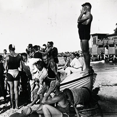 Crowd outside Manly Surf Pavilion watching a surf carnival