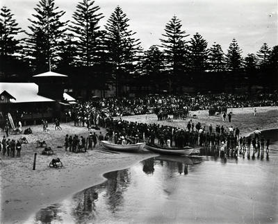 Crowd watching a surf carnival at Manly Beach