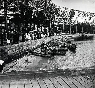 Boats being prepared for a Venetian carnival in Manly Cove