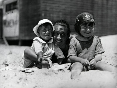 Man and two children on Manly Beach