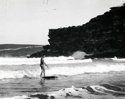 Man riding a surfboard