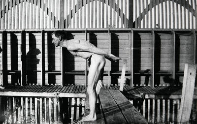 Man about to dive into Manly Baths