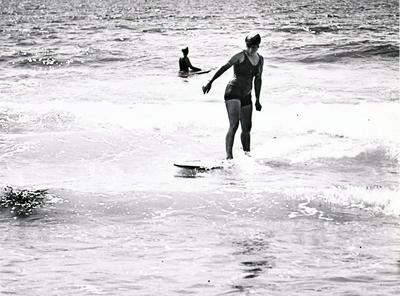 Woman riding a surfboard