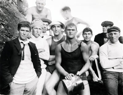 Group portrait of ten young men at an unknown location, but possibly one of the camps at Freshwater