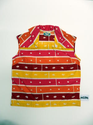 Cotton shirt with orange, red and yellow horizontal stripe, white divides and flower shapes, square collar front with two white buttons joining front slit, 'Liberty Brand' sailing wear. Machine sewn