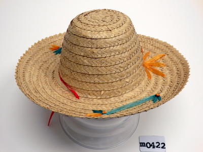 Straw and synthetic material natural colour with orange flower and green pattern wide brim red tape to fasten machine and hand sewn