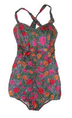 Mercerised cotton one piece printed with red, crimson, orange & green on grey background, a pattern of chrysanthemums & roses. Fabric is gathered below the bust and the bust has a single vertic bone. Wide shoulder straps cross at the back which is shirred