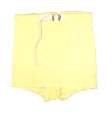 Pair of yellow cotton knit high waisted swimming trunks with cream canvas belt and modesty skirt. Metal buckle is marked 'RUSTLESS'