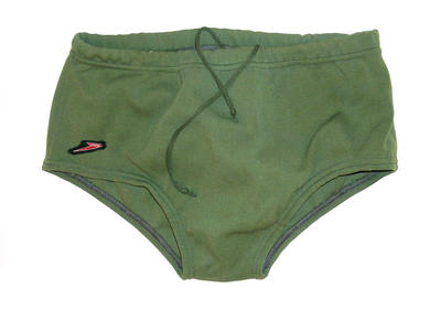 Bri-nylon trunks with cord in waist, elasticated legs and SPEEDO logo attached at right front.