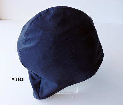 Black bathing cap of polyamid and elastan, machine made in 3 pieces with elasticated edge