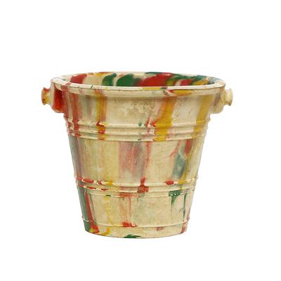 small rubber multicoloured bucket