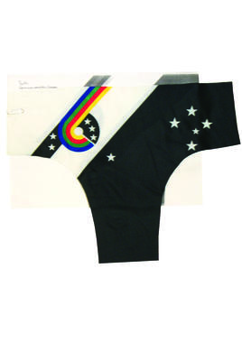 Sampler '1990 World Championships Perth' nylon? black white blue red green yellow white stars on black background striped rainbow diagonal emblem. Fabric is the front of men's trunks.