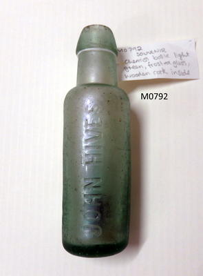 Chemist bottle light green frosted glass wooden cork inside of bottle round shape