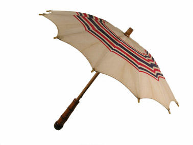 Parasol with wooden central rod canvas canopy of red and blue stripe on cream metal frame large wooden handle flat shape small size