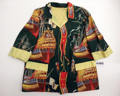 Cotton dark green pirate print yellow lining and trim 3/4 length elbow length sleeves square front pockets machine sewn