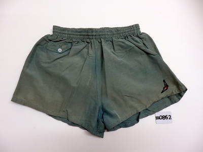 Rayon green loose boxer gathered elastic waist style small inside front pocket with white button