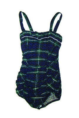 Blue and green tartan cotton one piece with fine white spots shirring entire back two elastic lines down front elastic leg short front panel buttoned shoulder straps machine sewn size 36. Very stylish example.