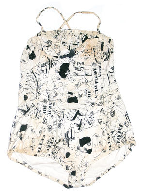 White and black printed cotton full piece shirring front and back elastic top and legs fastened by buttoned shoulder straps bloomer bottoms large size machine sewn label inside LHS, Black bow centre front, fabric features French words eg j'ai seul.