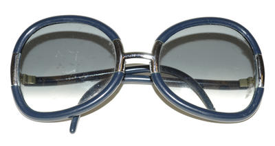 Sunglasses navy blue thick rimmed silver nose piece curled arms large circle variation eye piece