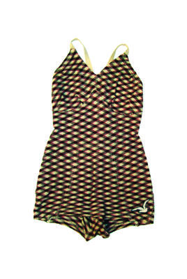 Woollen knitted swimsuit in beige/red/green/black. Beige knitted straps cross over and tie at back , low back, low cut legs with modesty skirt, seagull logo stitched LHS.