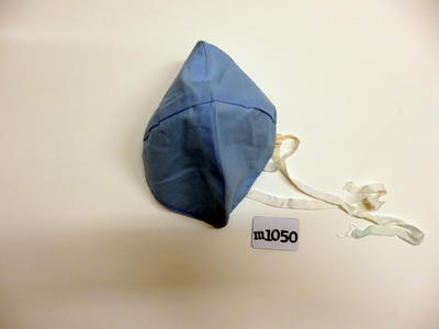 Life guard hat blue cotton lined with white cotton side tapes to fit either side of ears machine sewn