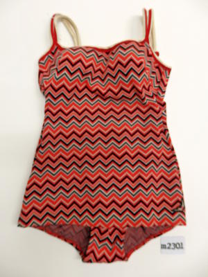 red, white and blue one piece with zig zag pattern and double shoulder straps