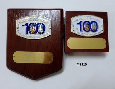 Prize plaque from Manly Centenary celebrations for pageant of Manly and also one unused plaque