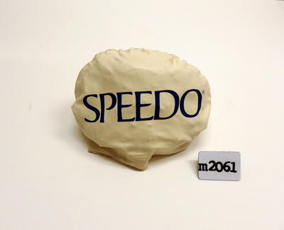 Speedo rubber swim cap white with grey shark print on one side Speedo label on the other