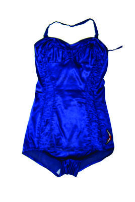 royal blue with two rouched panels going up the length of the bathers and around the bust. An embroidered lady is diving on the right hand side in a red costume. Rayon rubber fabric lightening zipper centre back.