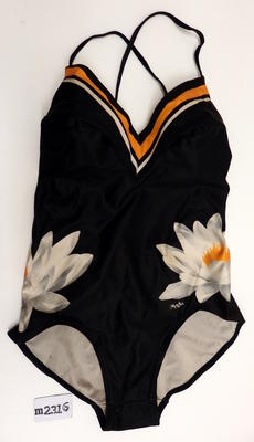 Black nylon one piece with white flowers and orange trim