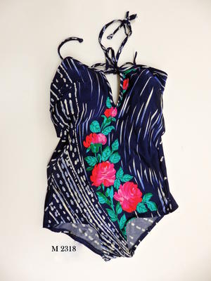 Dark blue one piece with white marks and pink flowers - halter neck and ties at bust