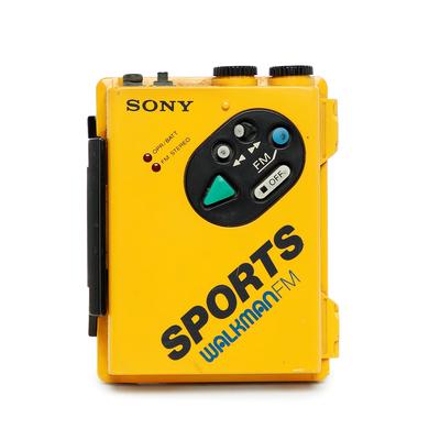 Sports walkman - radio and cassette player - in yellow plastic case