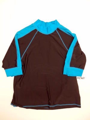 Black and aqua nylon with mid-length sleeves - worn over swimsuit to screen sun