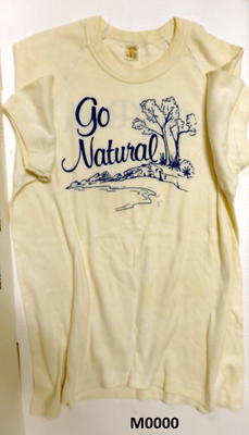 Adult off white cotton T-shirt with blue print front "Go Natural" back "Reef Beach" Ribbing border on neck and sleeves had sewn