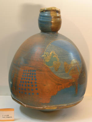 Turquoise, orange & gold vase