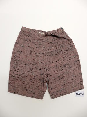 Helanca pink, grey, black and white flecked shorts double darts each side, waistband side zipper, grey button. Machine made