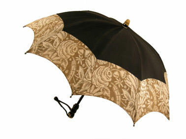 Parasol with black wooden central rod, black cotton canopy with khaki floral pattern on the bottom half, handle with black rope, steep dome shape, British made