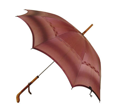 Parasol with central metal rod, wood golf club like handle leather imbedded in shaft with leather strap attached by metal ring, purple canopy with gold striping