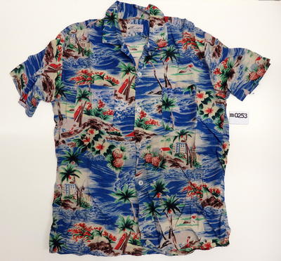 Short sleeves button front tropical island design-palm trees fruit flowers on a blue 'sea' background rayon machine sewn