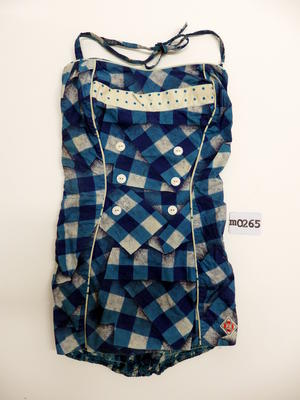 Blues and white check cotton white with blue dots across bust piping across bust and down front panel six white buttons down front shirred back lap front S34