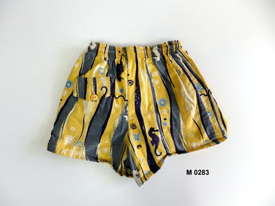 Trunks cotton striped with yellow dark grey black plus assorted marine motifs front RHS flap pocket with yellow button elastic waist cord lined with separate brief lining in stretch knit machine sewn label back inside