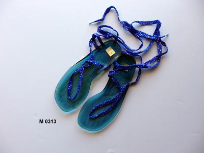 Blue transparent plastic thong-like arrangement with wraparound laces lace loop through at toe and ankle sides S7