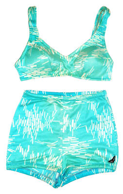 Nylon aqua with white rod design top has a gold link clasp and inset cups fabric has a glitter sheen to it machine made