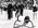 Group portrait of officials and competitors at a surf carnival at Manly Beach