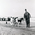 Horse and a man dressed as a giant on Manly Beach